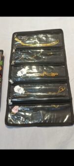 Folded floral print makeup and jewellery organizer – portable roll-up pouch for travel